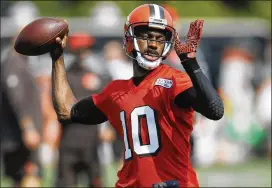  ?? AP FILE ?? Robert Griffin III sat out the 2017 season after being cut by the Browns. “I feel like we got a steal,” Ravens coach John Harbaugh said of the 2011 Heisman Trophy winner.