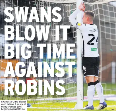  ??  ?? Swans star Jake Bidwell can’t believe it as one of many chances goes begging against Bristol