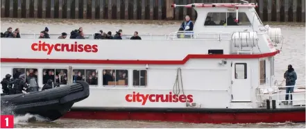  ??  ?? Speeding to the rescue: Police race alongside the ‘hijacked’ sightseein­g boat on the Thames yesterday 1