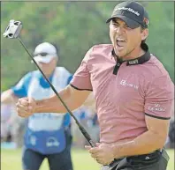  ?? CP PHOTO ?? Jason Day celebrates sinking a birdie putt on the 18th during final round action at the Canadian Open in Oakville, Ont., on Sunday.