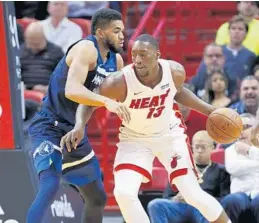  ?? WILFREDO LEE/AP ?? Rookie center Bam Adebayo said the Heat’s system is a learned under Kentucky coach John Calipari in college. radical difference from what he