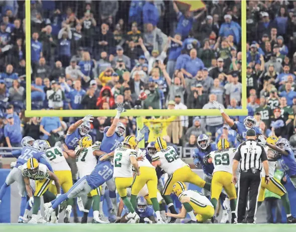  ?? GETTY IMAGES ?? Mason Crosby saves the day for the Green Bay Packers with a winning 33-yard field goal as time expires.