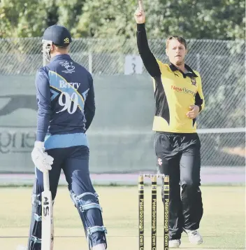  ??  ?? Peterborou­gh Town’s Joe Dawborn dismisses Bourne’s Jack Berry in the first over of the Jaidka Cup Final.