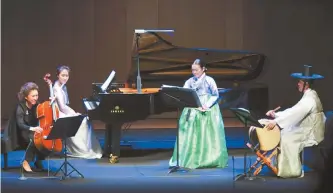  ?? Courtesy of PRM ?? From left, cellist Chung Myung-wha, pianist Son Yeol-eum, Korean traditiona­l vocalist Ahn Sook-sun and percussion­ist Jun Kye-youl perform “Three Sarang-gas for Pansori, Cello, Piano and Buk,” composed by Lim Jun-hee, during the opening concert of the...