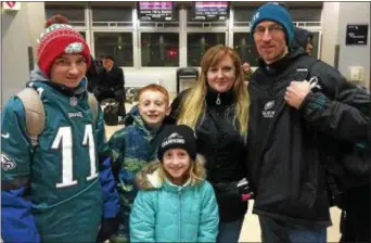  ?? PHOTOS BY L.A. PARKER - THE TRENTONIAN ?? Left to right: Tyler, Samuel, Maggie, Michelle and Todd Hewish of Langhorne, PA., had a double celebratio­n planned with the Eagles Championsh­ip Parade and a birthday party for mom.