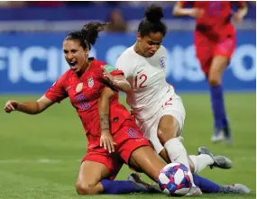  ?? AP PHOTO BY FRANCISCO SECO ?? England's Demi Stokes, right, and United States' Carli Lloyd duel for the ball during the Women's World Cup semifinal soccer match between England and the United States, at the Stade de Lyon outside Lyon, France, Tuesday.