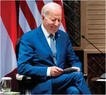  ?? AFP PHOTO ?? LIGHT MOMENT
United States President Joe Biden smiles during his meeting with his Indonesian counterpar­t Joko Widodo (not in picture) on the sidelines of the Group of 20 summit in Nusa Dua, on the Indonesian resort island of Bali, on Monday, Nov. 14, 2022.
