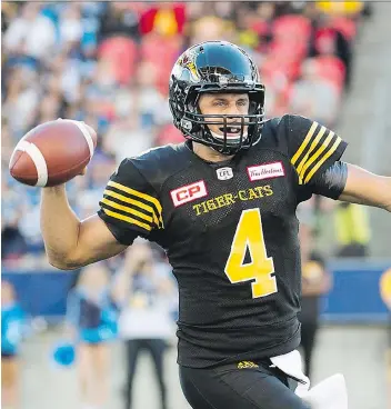  ?? NATHAN DENETTE/THE CANADIAN PRESS ?? Zach Collaros and the Tiger-Cats have been a puzzle this season.