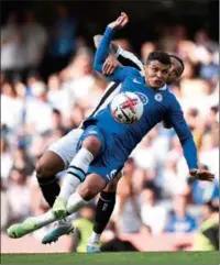  ?? (AFP) ?? Chelsea’s Brazilian defender Thiago Silva (front) fights for the ball with Newcastle United’s English striker Callum Wilson (rear) during their English Premier League match in London recently.