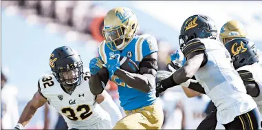  ?? KELVIN KUO/AP ?? UCLA and Cal threw together their impromptu Sunday game in less than 48 hours.