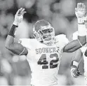  ?? [OKLAHOMAN ARCHIVES] ?? Former OU linebacker Rufus Alexander, left, is now coaching at Northeast Academy.