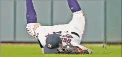  ?? Getty Images ?? ROBBED: Astros right fielder Josh Reddick made a spectacula­r catch of a line drive by Brett Gardner that likely prevented the Yankees from taking the lead in the sixth inning Saturday.