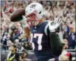  ?? STEVEN SENNE — THE ASSOCIATED PRESS ?? New England Patriots tight end Rob Gronkowski (87) celebrates his touchdown against the Houston Texans during the first half of an NFL football game, Sunday in Foxborough, Mass.