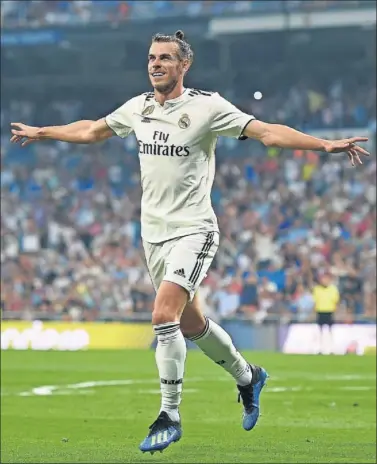  ??  ?? NUEVOS TIEMPOS. Bale ha arrancado la temporada con tres goles y radiante de felicidad.