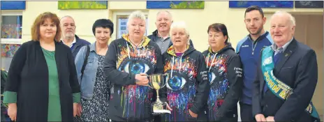  ?? (Photo: Katie Glavin) ?? Alice and Dave Fleming, Gaye O’Doherty, Anna O’Connor, Brendan Buckley, Betty O’Connell, Trisha Coughlan, James O’Sullivan and John Murphy as Clondulane NS, Fermoy Street Arts and the Clondulane community were presented with the trophy for ‘Best Overall’ entry by the Fermoy St Patrick’s Day parade committee.