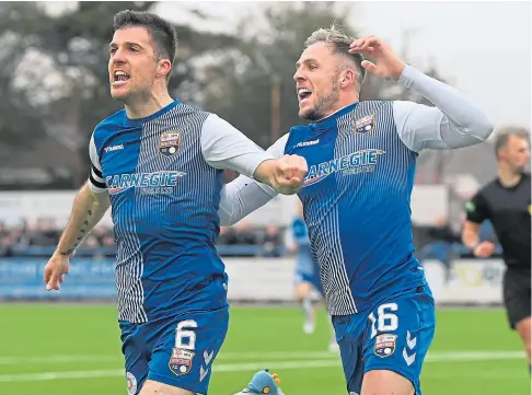  ?? ?? ADVANTAGE: Craig Johnston, right, and Terry Masson celebrate Montrose’s winning goal in the first leg.