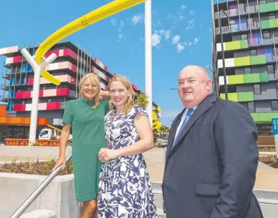  ??  ?? Gold Coast Deputy Mayor Donna Gates, Commonweal­th Games Minister Kate Jones and Grocon national constructi­on manager Peter Ward at the handover of the athletes village in late September.