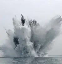  ??  ?? The mine exploding off the coast of the Isle of Wight