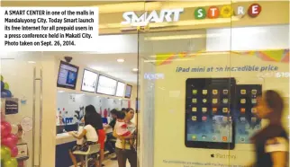  ??  ?? A SMART CENTER in one of the malls in Mandaluyon­g City. Today Smart launch its free Internet for all prepaid users in a press conference held in Makati City. Photo taken on Sept. 26, 2014.