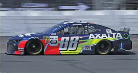  ?? AP PHOTO/CHARLES KRUPA ?? Alex Bowman heads down the track during Friday’s Cup Series practice at New Hampshire Motor Speedway in Loudon. Bowman crashed his backup car during Saturday’s final practice and will drive a spare car from Hendrick Motorsport­s teammate Jimmie Johnson in today’s race.