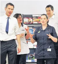  ??  ?? The then Chancellor George Osborne, right, and Secretary of State for Health Jeremy Hunt on a tour of NHS facilities following the groundbrea­king £6bn Greater Manchester budget deal