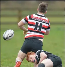  ??  ?? David O’Dwyer is tackled by Ronan Greene of Dundalk.