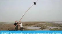  ??  ?? KUWAIT: Experts conduct a survey of submerged relics off Failaka island. —KUNA photos