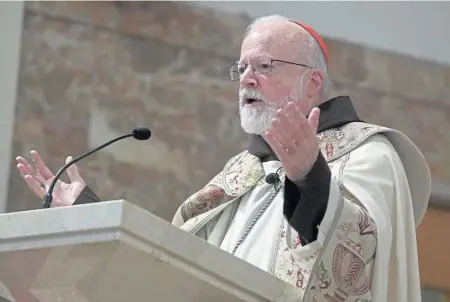  ?? JIM MICHAUD / BOSTON HERALD ?? ‘I’M STILL ON THE COMMISSION’: Cardinal Sean P. O’Malley addresses the audience at the 2018 Cheverus Awards yesterday at the Immaculate Conception Church in Malden. O’Malley not being on the organizing committee for a Vatican summit on preventing the abuse of minors has raised questions.