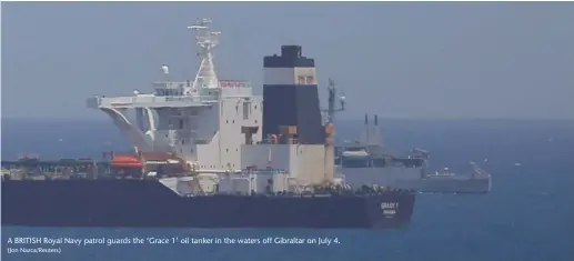  ?? (Jon Nazca/Reuters) ?? A BRITISH Royal Navy patrol guards the ‘Grace 1’ oil tanker in the waters off Gibraltar on July 4.