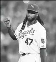  ??  ?? PUMPED UP: Johnny Cueto pumps his fist after the final out of his four- hit shutout of the Detroit Tigers Monday night in Kansas City, Mo. In his first home start with the Royals, Cueto struck out eight, walked one and did not allow a runner past...