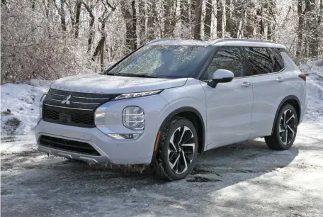  ?? MARC GRASSO PHOTOS / BOSTON HERALD ?? GETTING AN UPGRADE: The Mitsubishi Outlander has been updated through a collaborat­ion with Nissan, bringing new life, and a wider platform, to the affordable compact SUV.