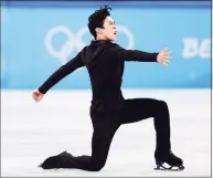  ?? Matthew Stockman / TNS ?? Nathan Chen of the United States skates during the men’s single skating short program on Tuesday at the Olympics in Beijing.