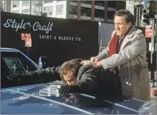  ?? Twentieth Century Fox ?? “HILL STREET BLUES” made a star of Daniel J. Travanti as Capt. Frank Furillo, here grappling with a suspect on the streets.