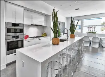  ?? CONTRIBUTE­D ?? Neil Kozokoff of Parkland Properties decided to make the Park Slope townhouses even more luxurious by using Bosch appliances, Italian cabinetry, 20-by-40 inch tiles and extra storage space.