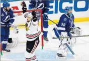  ?? Mike Carlson Getty Images ?? ANTOINE VERMETTE celebrates a goal in Game 5, which put Chicago in position to win the Stanley Cup.