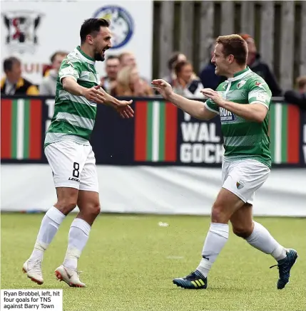  ??  ?? Ryan Brobbel, left, hit four goals for TNS against Barry Town