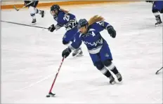  ?? COLIN CHISHOLM ?? Macey Johnston, number 15 with the Avon View Avalanche, makes her way up the ice.