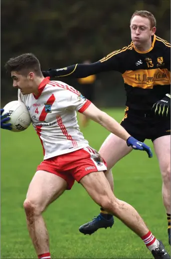  ??  ?? Colm Ó Muircheart­aigh An Ghaeltacht challenged by Colm Cooper Dr Crokes in the Kerry County League final at Lewis Road, Killarney on Sunday Photo by Michelle Cooper Galvin FIXTURES