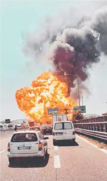  ??  ?? The massive explosion following the crash between a tanker truck and lorry in Bologna, Italy.