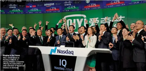  ??  ?? Ringing in the Future iqiyi, which listed on Nasdaq in March, is among Chinese companies offering its subscriber­s a wide selection of theatrical choices on demand.