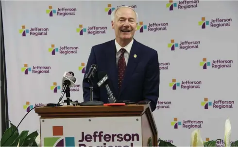  ?? (Pine Bluff Commercial/Eplunus Colvin) ?? Gov. Asa Hutchinson applauded the staff at Jefferson Regional Medical Center on Thursday, saying it led the way in the state in creating best practices for dealing with the coronaviru­s.