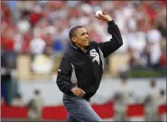  ?? NAM Y. HUH - ASSOCIATED PRESS ?? In this July 14, 2009, file photo, President Barack Obama throws out the ceremonial first pitch during the MLB AllStar baseball game in St. Louis.