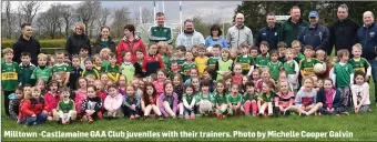  ?? Milltown -Castlemain­e GAA Club juveniles with their trainers. Photo by Michelle Cooper Galvin ??