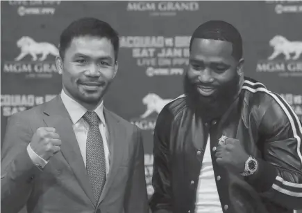  ?? AP Photo ?? ITS ON. Manny Pacquiao, left, and Adrien Broner pose for photograph­ers at a news conference, Monday, Nov. 19, 2018, in New York. Pacquiao will defend his World Boxing Associatio­n welterweig­ht title against Broner on Jan. 19, 2019, in Las Vegas.