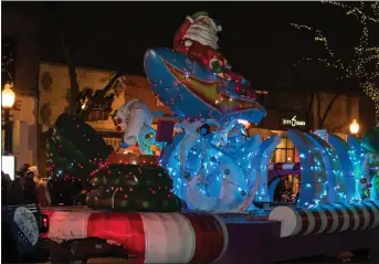  ?? PHOTO COURTESY OF 360EVENTS PRODUCTION ?? The Royal Oak Jingle and Light Parade comes to the downtown Saturday, with a chance for people to visit with Santa and take part in a cookie crawl at more than 20business­es.