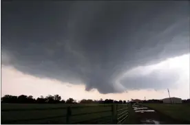  ?? PHOTO COURTESY OF MATTHEW CAPPUCCI ?? A wall cloud looms over northwest Oklahoma on May 22, 2019shortl­y before producing a tornado.