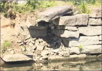  ?? Mayor Dan Drew/ Contribute­d photo ?? A 35-foot section of the brownstone retaining wall that supports the Connecticu­t River coastline at Harbor Park in Middletown gave way last week. Officials said from Sunday to Monday the hole had grown and the ground had eroded significan­tly. A police...