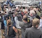  ??  ?? Lori Van Buren / Times Union archive Joseph L. Bruno is surrounded by the media in Albany in 2010.