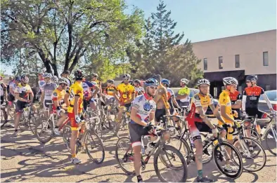  ?? COURTESY OF THE TOUR DE LOS ALAMOS ?? Riders in the Tour de Los Alamos face a number of downhill portions as the route winds through the pines.