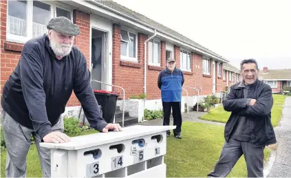  ?? PHOTO: PETER MCINTOSH ?? Feeling the pinch . . . Invercargi­ll City Council housing unit tenants (from left) Ken McNaught, Michael Reid and Nehua Henare are worried about a proposed rent increase.